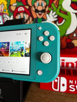 Nintendo Switch Lite COMO NUEVA 10/10