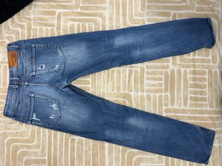 Vaqueros desgastados azules