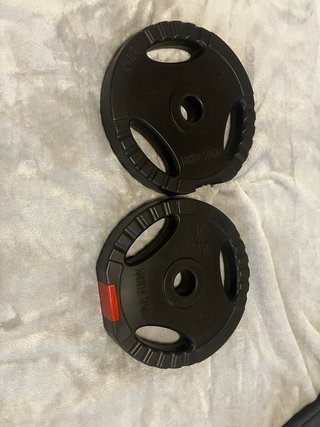 Barra de pesas (de rosca) + 2 discos de 2.5kg.