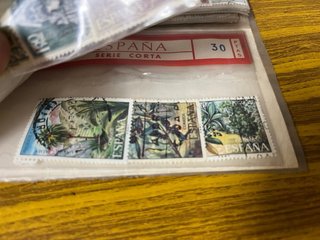 370 sellos aproximadamente cuaderno españa usado