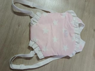 Porta bebés juguete La Nina estrellas rosa