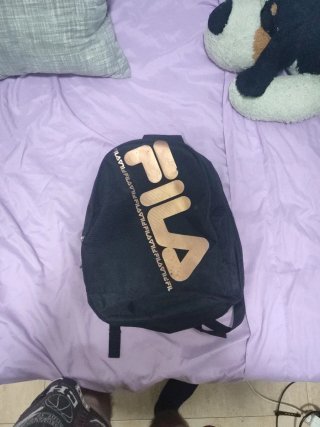 Mochila Fila Negra y Dorada