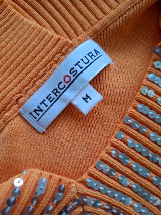 Blusa naranja con lentejuelas