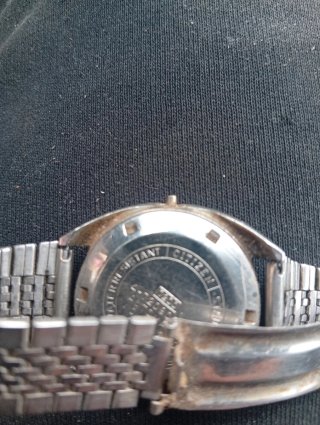Reloj  atomatico Citizen Plata y Blanco escucho of
