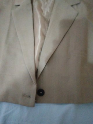Chaleco corto beige