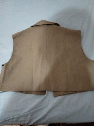 Chaleco corto beige