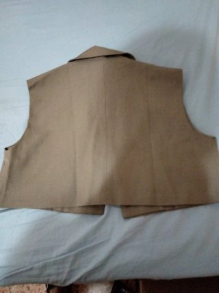 Chaleco corto beige