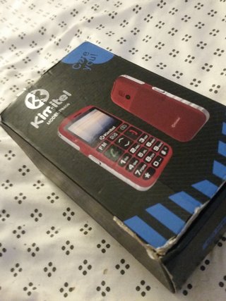 Teléfono móvil Kimitel retro rojo y blanco
