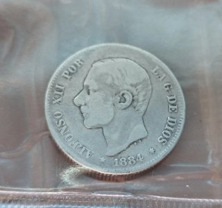 A spot difíciles 2 pesetas plata 1884