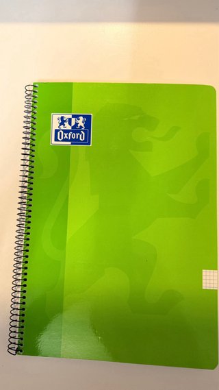 3 libretas espiral naranja, verde y beige