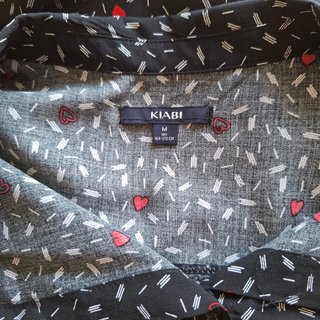 Camisa Kiabi negra con nudo delantero