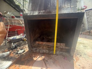 Chimenea de piedra y madera