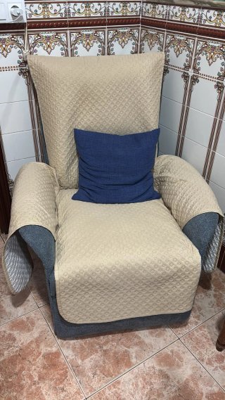 Sofá sillón gris de tela eléctrico