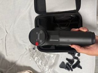 Pistola de masaje muscular con maletín y cargador