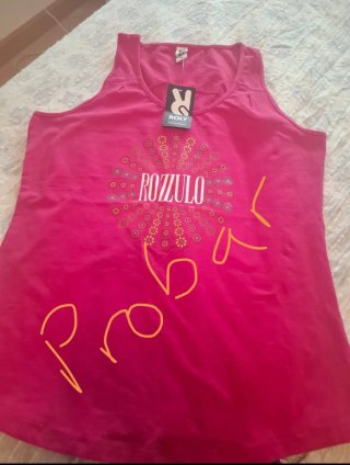 2 Camisetas Deportivas Grises.Y resto variado.