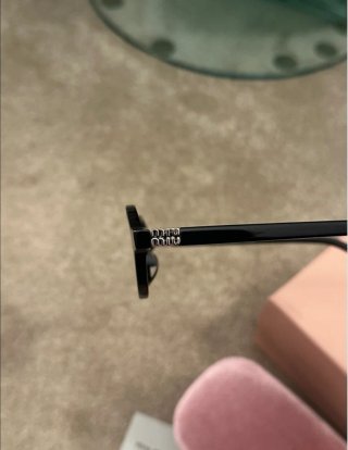 Miu Miu Occhiali da Sole SMU04Z Neri