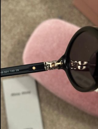 Miu Miu Occhiali da Sole SMU04Z Neri