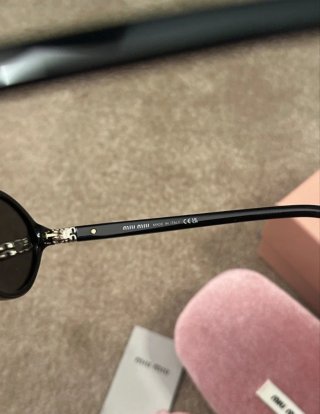 Miu Miu Occhiali da Sole SMU04Z Neri
