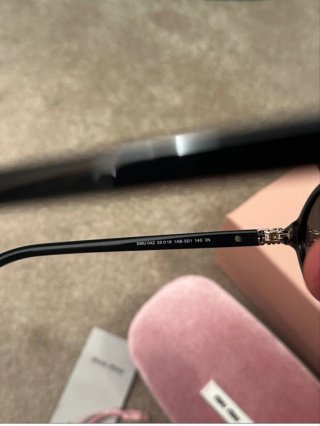 Miu Miu Occhiali da Sole SMU04Z Neri