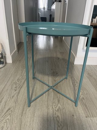 Mesa auxiliar redonda azul