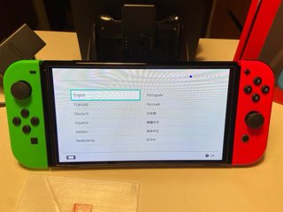 Nintendo Switch OLED + Mario Kart 8 Deluxe + MicroSD