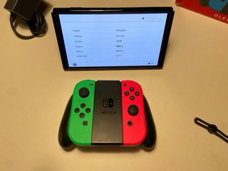 Nintendo Switch OLED + Mario Kart 8 Deluxe + MicroSD