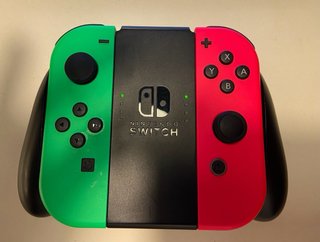 Nintendo Switch OLED + Mario Kart 8 Deluxe + MicroSD
