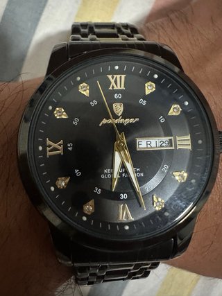 Reloj Poedagar Negro y Dorado