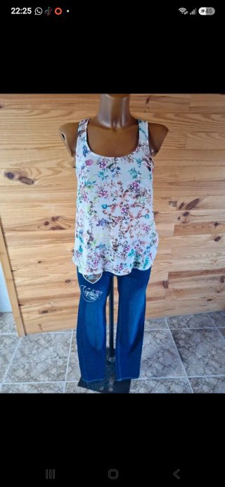Pantalón vaquero niña talla 12 y blusa.