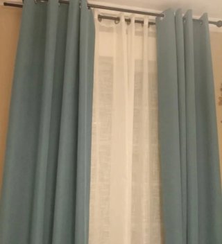 Cortinas opacas azul niebla.