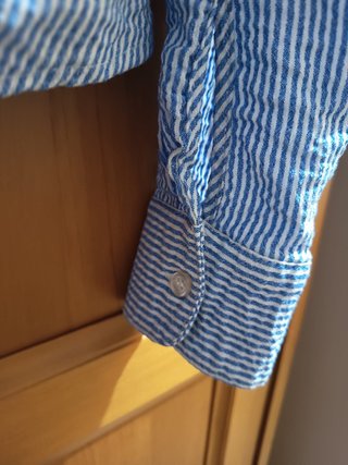 Blusa elástica H&M anudada rayas