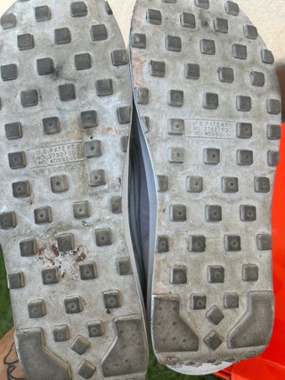 Sneakers Nike grigie e bianche
