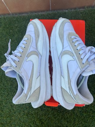 Sneakers Nike grigie e bianche
