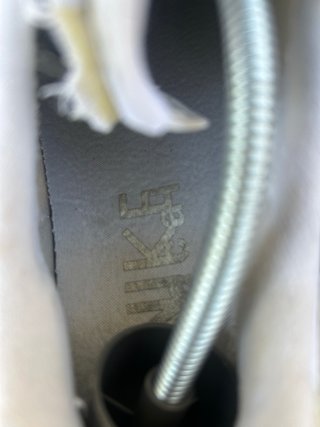Sneakers Nike grigie e bianche