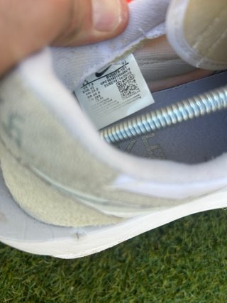 Sneakers Nike grigie e bianche