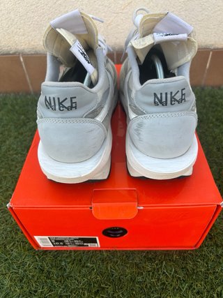 Sneakers Nike grigie e bianche