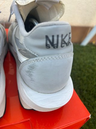Sneakers Nike grigie e bianche