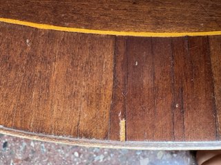Mesa de comedor ovalada de madera extensible