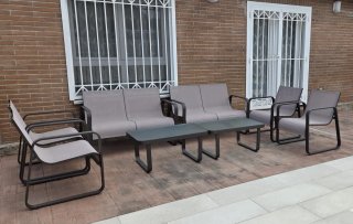 Conjunto sofás y mesas exterior.