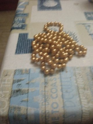 Collar de perlas doradas