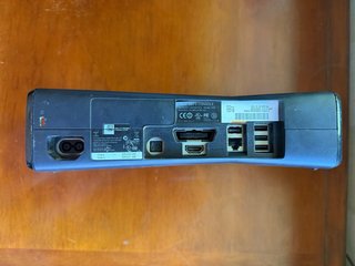 Xbox 360 Slim Negra y Plateada