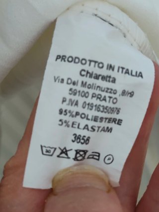 Abito asimmetrico con plissé Made in Italy