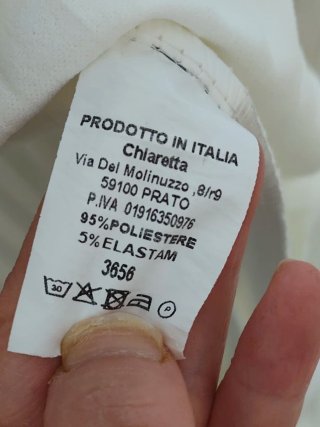 Abito asimmetrico con plissé Made in Italy