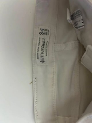 Pantalones vaqueros blancos rotos