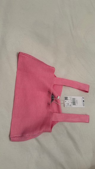 Top rosa cruzado de punto