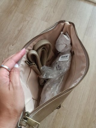 Bolso de mano con flecos