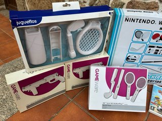 Nintendo Wii + Wii Fit + Accessori e Giochi