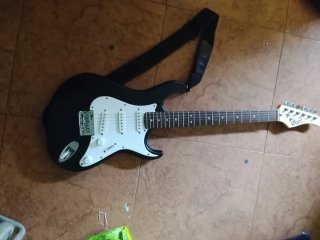 Guitarra Eléctrica Cort y amplificador