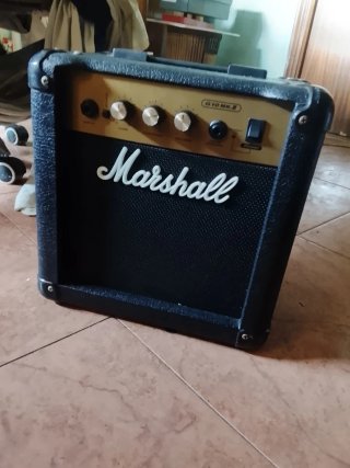 Guitarra Eléctrica Cort y amplificador
