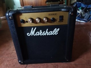 Guitarra Eléctrica Cort y amplificador